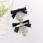 2Pcs Skeleton Hand Hair Clips with Bowknot - Cute Skull Claw Hairpins for Girls, Party Cosplay - Image 2