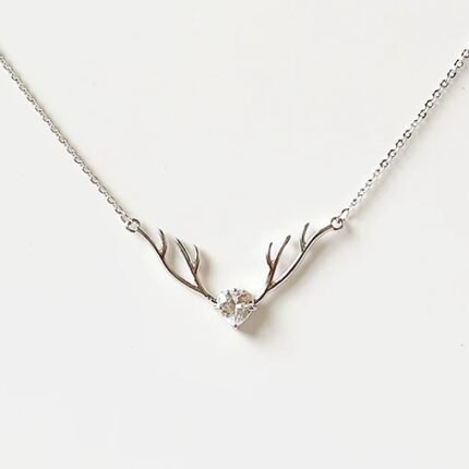 Light and graceful antler necklace with rhinestone pendant and clavicle chain